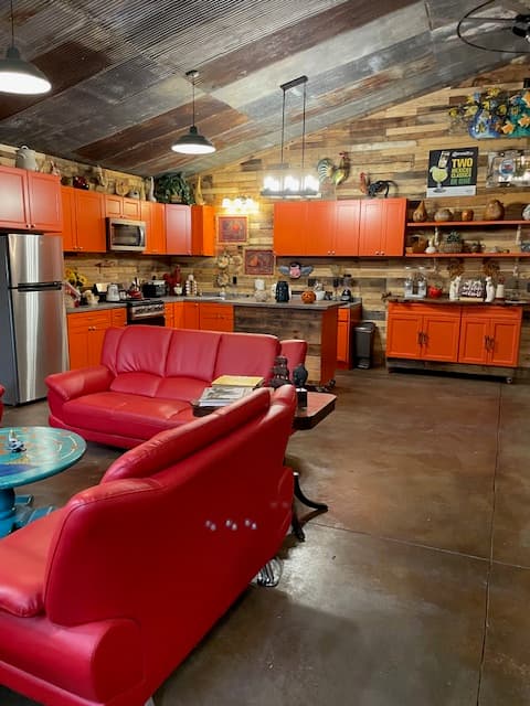 large living room dining area and full guest kitchen